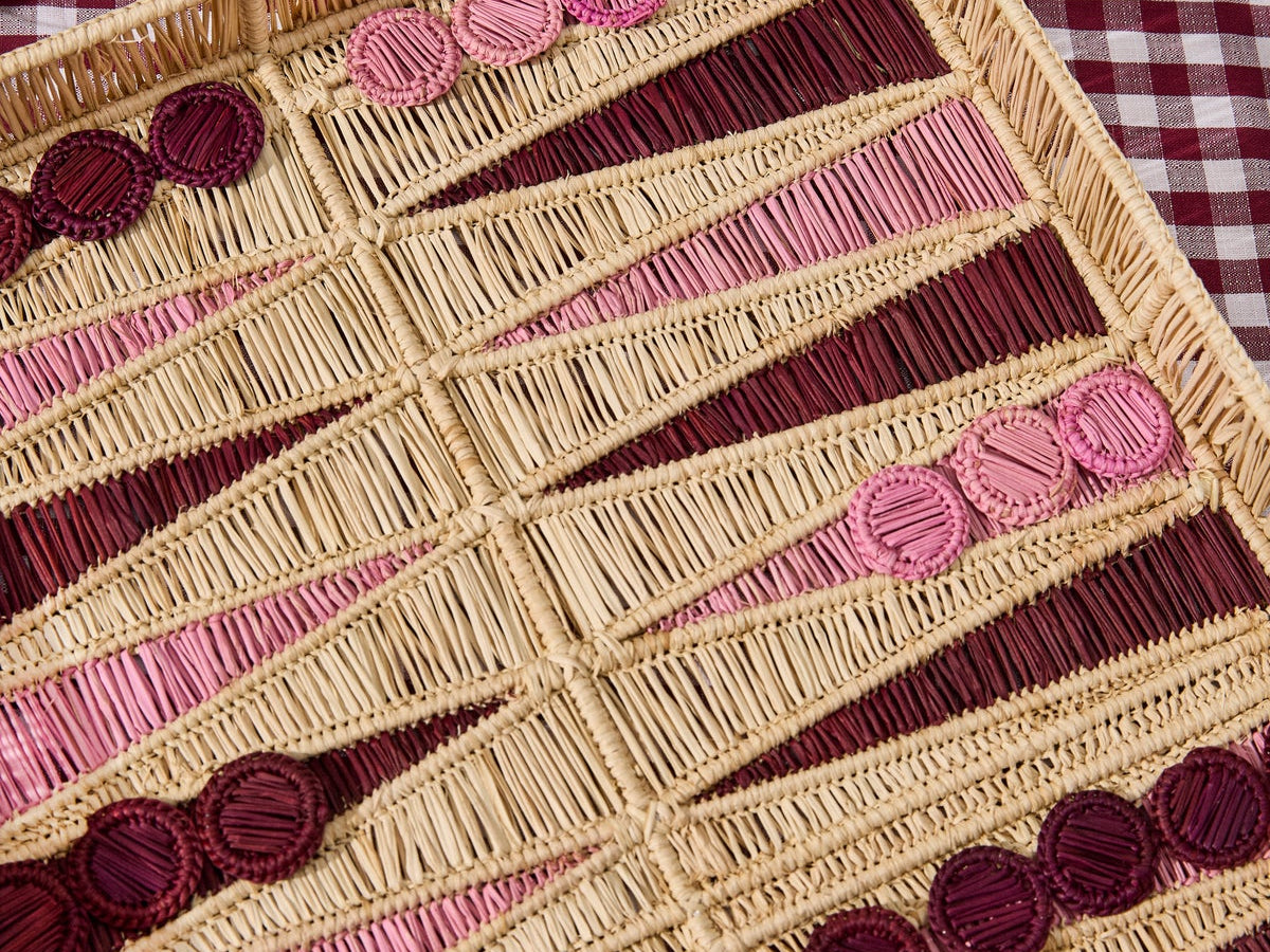 Handwoven backgammon board in natural and pink palm fibers
